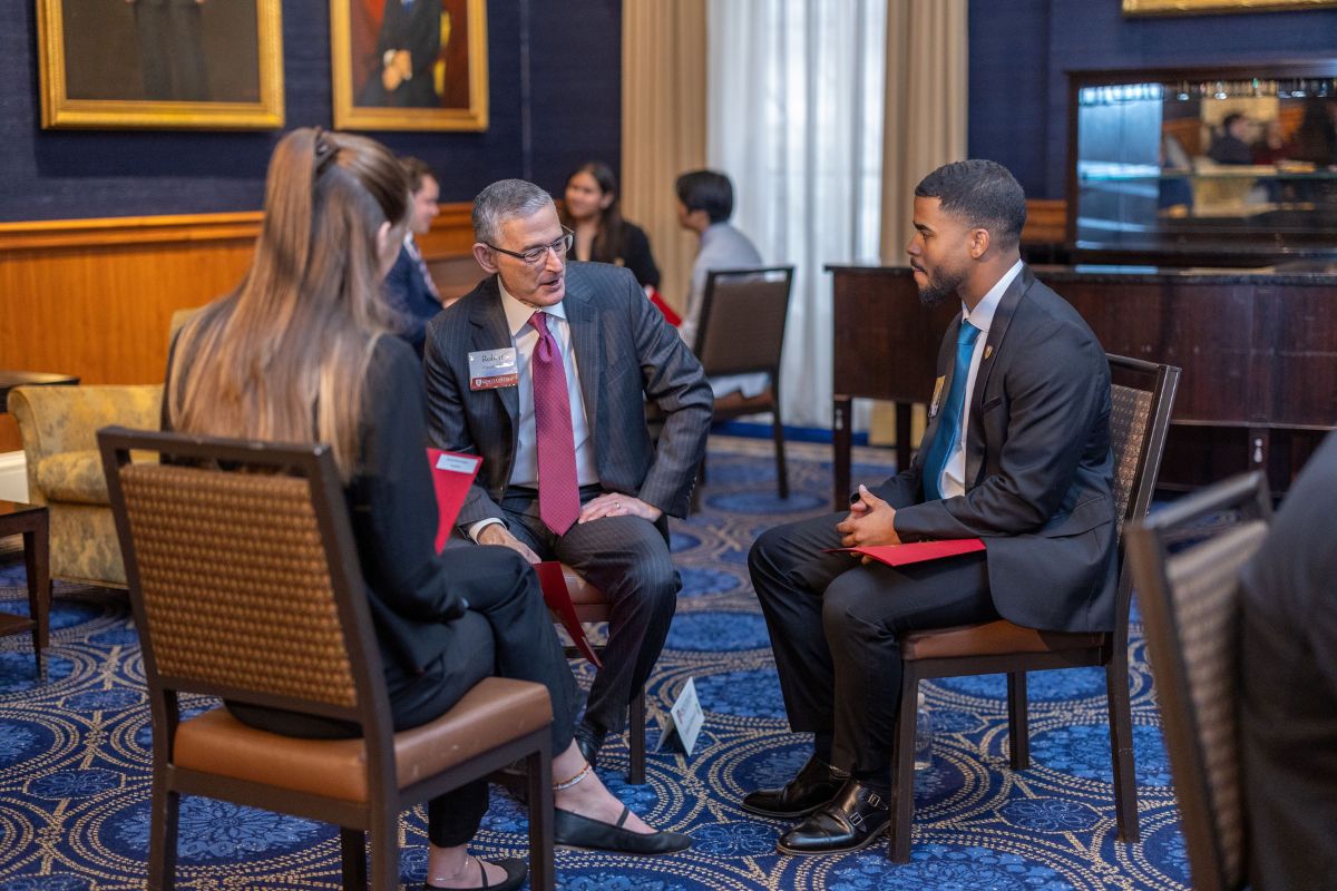 Ciaruffoli mentoring students during Business Forum