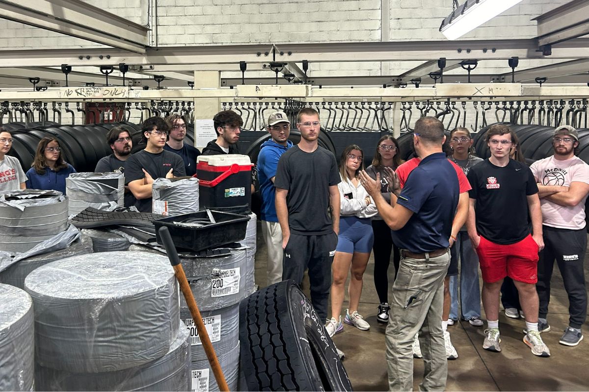 Students at Tire Retread Plant